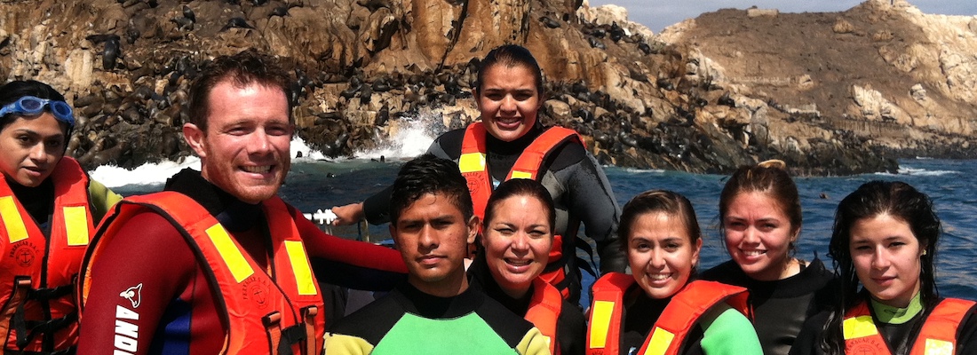 Group of students wearing life jackets near